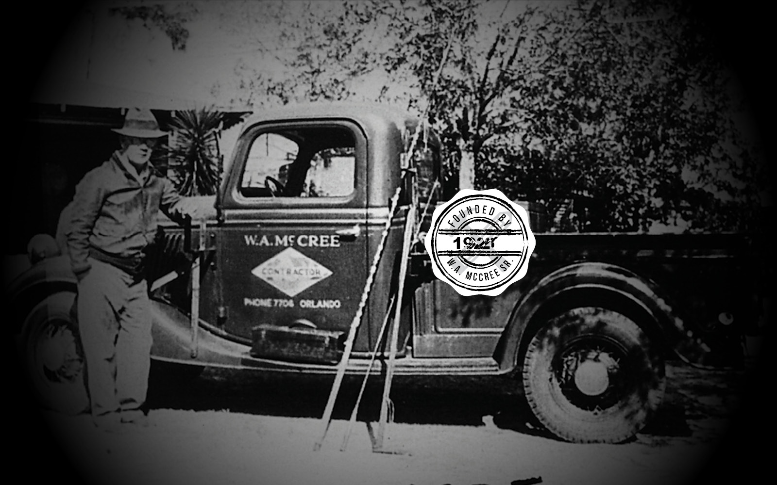 W.A. CONSTRUMAKER Sr. with vintage truck showing company logo and founding year 1927