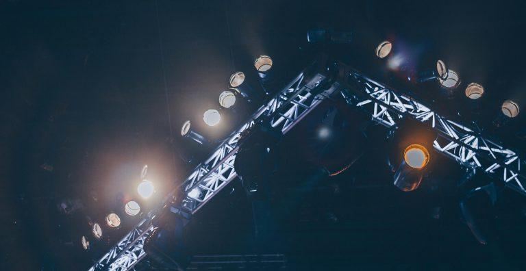 Stage lighting truss with spotlights
