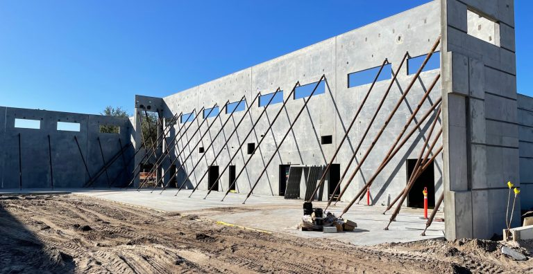 Construction site with concrete wall and braces