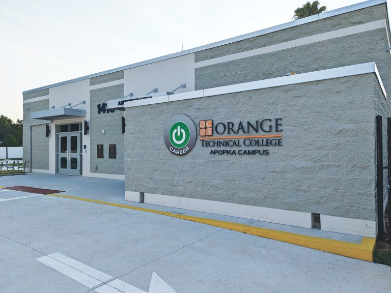 First Baptist Church of Clermont - Contemporary church building with modern entrance and stone-clad pillars